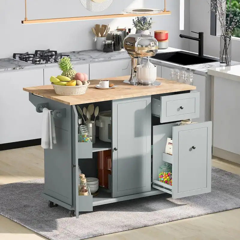 Îlot de cuisine en hévéa avec plateau rabattable de 136,9 cm de large, sur 5 roulettes avec étagère de rangement interne et meuble coulissant à 3 niveaux