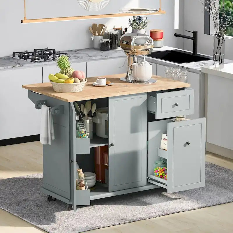 Îlot de cuisine en hévéa avec plateau rabattable de 136,9 cm de large, sur 5 roulettes avec étagère de rangement interne et meuble coulissant à 3 niveaux