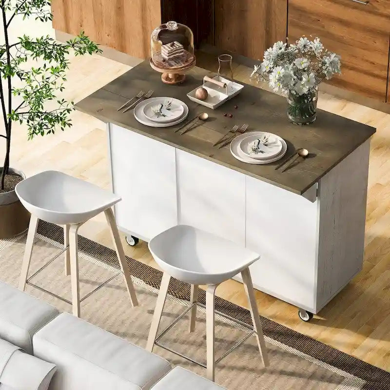 Îlot de cuisine rétro de 129,5 cm de large avec plateau abattant, 4 roulettes, étagère de rangement interne et porte-serviettes